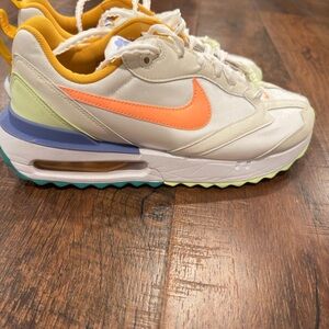 Nike Sneakers with Orange and Cream Accents